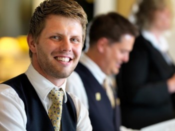 Smiling Hotel Employee